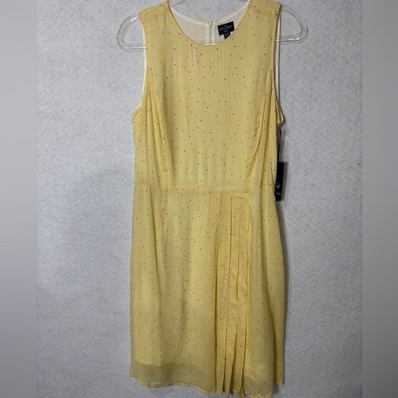 Savile Row Dresses & Skirts - The Savile Row Dress This is a beautiful yellow dress with small print.